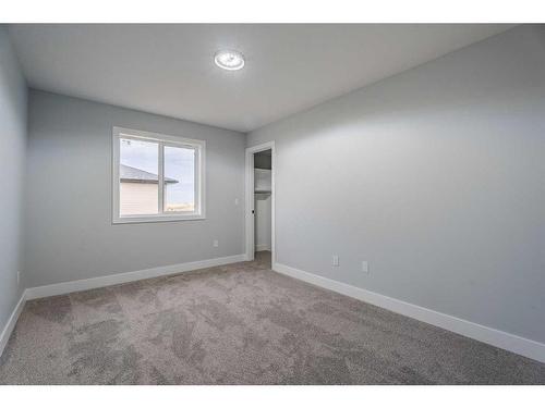 1439 Scarlett Ranch Boulevard, Carstairs, AB - Indoor Photo Showing Other Room