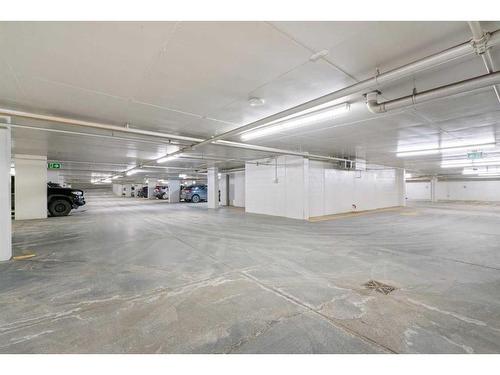 2101-1234 5 Avenue Nw, Calgary, AB - Indoor Photo Showing Garage