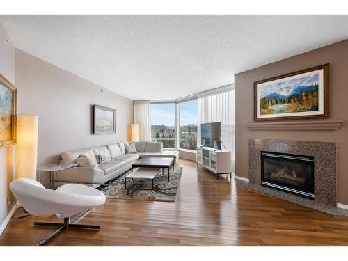 505-837 2 Avenue Sw, Calgary, AB - Indoor Photo Showing Living Room With Fireplace