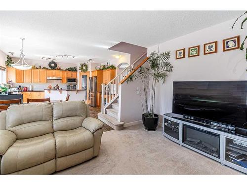 344 Windermere Drive, Chestermere, AB - Indoor Photo Showing Living Room