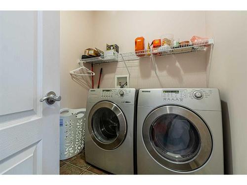 344 Windermere Drive, Chestermere, AB - Indoor Photo Showing Laundry Room