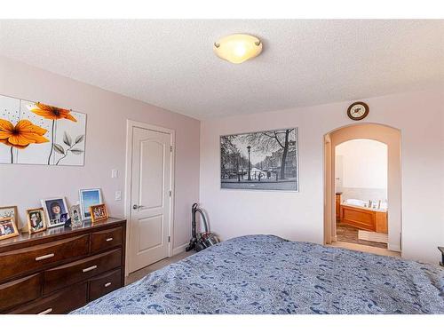 344 Windermere Drive, Chestermere, AB - Indoor Photo Showing Bedroom