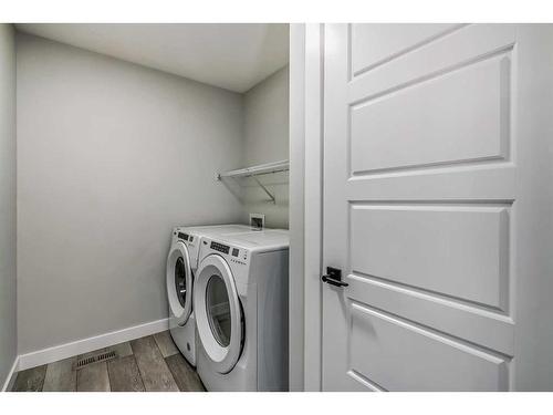 157 Belmont Villas Sw, Calgary, AB - Indoor Photo Showing Laundry Room