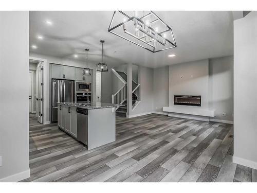 157 Belmont Villas Sw, Calgary, AB - Indoor Photo Showing Kitchen With Stainless Steel Kitchen