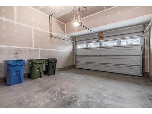 157 Belmont Villas Sw, Calgary, AB - Indoor Photo Showing Garage