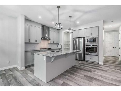157 Belmont Villas Sw, Calgary, AB - Indoor Photo Showing Kitchen With Stainless Steel Kitchen With Upgraded Kitchen