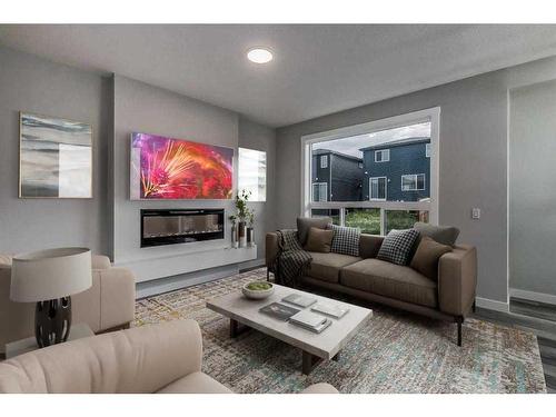 157 Belmont Villas Sw, Calgary, AB - Indoor Photo Showing Living Room With Fireplace