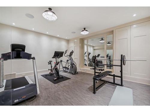3035 Roxboro Glen Road Sw, Calgary, AB - Indoor Photo Showing Gym Room
