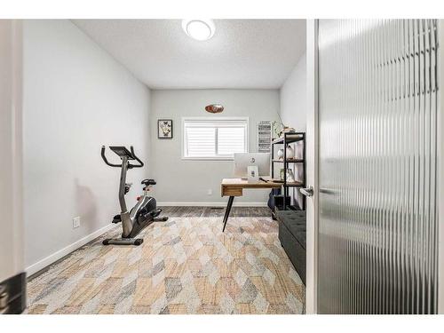 240 Lucas Crescent Nw, Calgary, AB - Indoor Photo Showing Gym Room