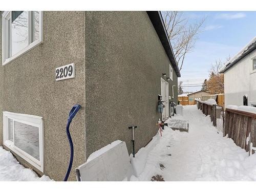 2211,2209 48 Street Se, Calgary, AB - Outdoor With Exterior