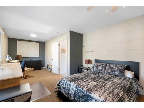10931 Willowfern Drive Se, Calgary, AB - Indoor Photo Showing Bedroom