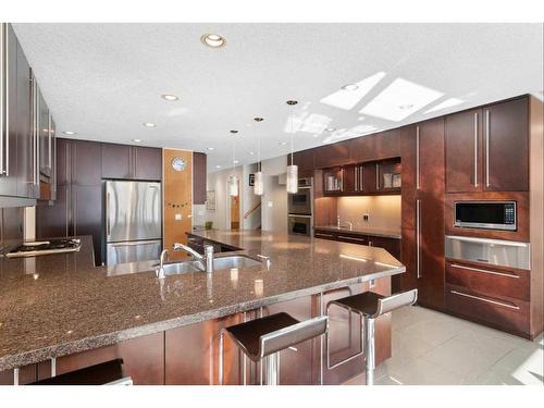 10931 Willowfern Drive Se, Calgary, AB - Indoor Photo Showing Kitchen With Double Sink With Upgraded Kitchen