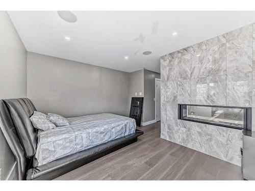 1808 8 Street Sw, Calgary, AB - Indoor Photo Showing Bedroom With Fireplace