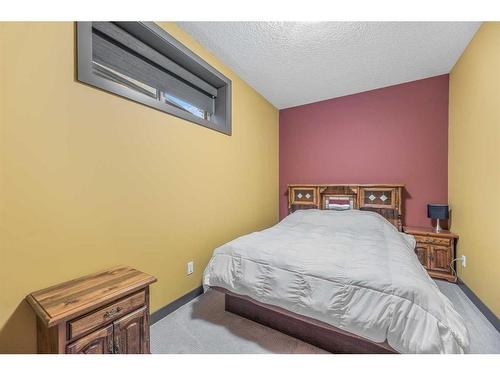652 Quarry Way Se, Calgary, AB - Indoor Photo Showing Bedroom