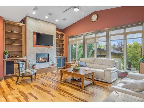 652 Quarry Way Se, Calgary, AB - Indoor Photo Showing Living Room With Fireplace