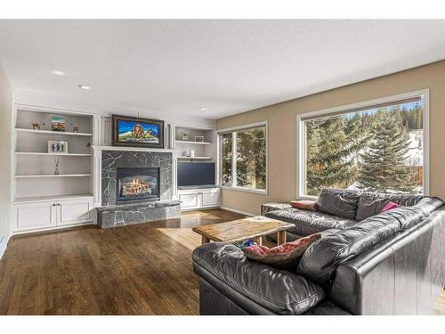 33 Eagle Landing, Canmore, AB - Indoor Photo Showing Living Room With Fireplace