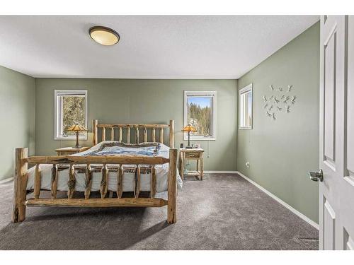 33 Eagle Landing, Canmore, AB - Indoor Photo Showing Bedroom