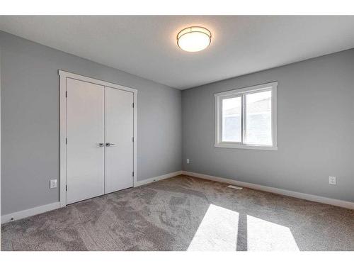 26 Hanson Drive, Langdon, AB - Indoor Photo Showing Other Room