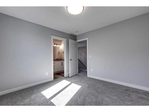 26 Hanson Drive, Langdon, AB - Indoor Photo Showing Other Room