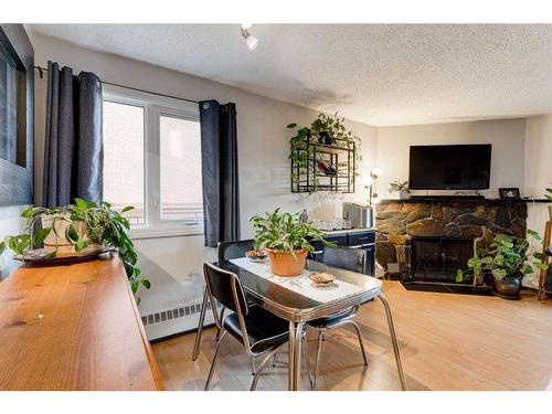 101-635 4 Avenue Ne, Calgary, AB - Indoor With Fireplace