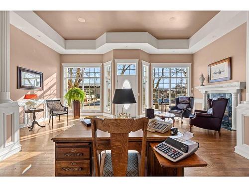 2014 20 Avenue, Didsbury, AB - Indoor Photo Showing Living Room With Fireplace