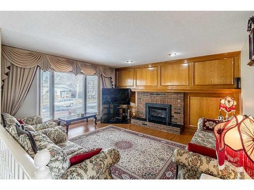 388 Whiteridge Crescent Ne, Calgary, AB - Indoor Photo Showing Living Room With Fireplace