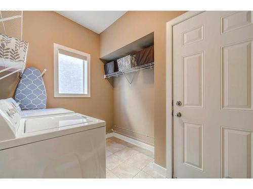 496 Everbrook Way Sw, Calgary, AB - Indoor Photo Showing Laundry Room