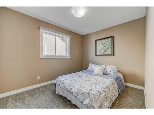 496 Everbrook Way Sw, Calgary, AB - Indoor Photo Showing Bedroom