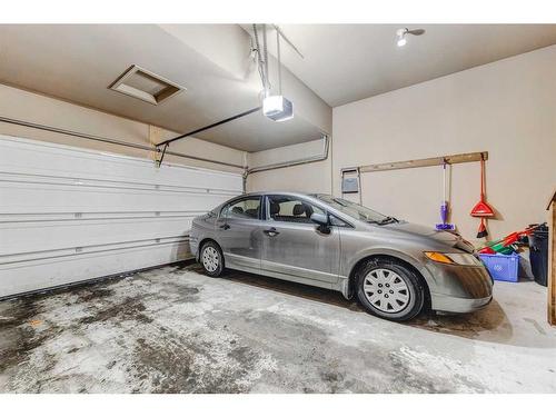 496 Everbrook Way Sw, Calgary, AB - Indoor Photo Showing Garage