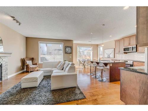 496 Everbrook Way Sw, Calgary, AB - Indoor With Fireplace