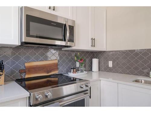139 Cranbrook Walk Se, Calgary, AB - Indoor Photo Showing Kitchen With Upgraded Kitchen