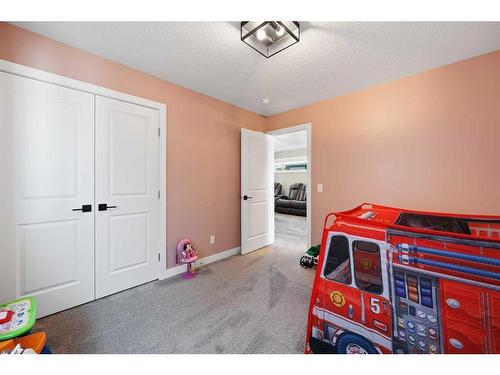 435 Rivercrest Boulevard, Cochrane, AB - Indoor Photo Showing Bedroom