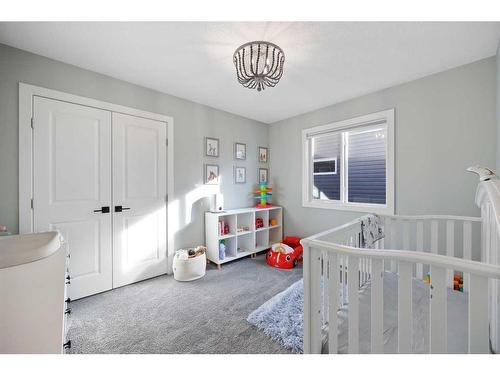 435 Rivercrest Boulevard, Cochrane, AB - Indoor Photo Showing Bedroom