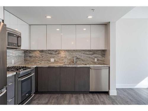 304-560 6 Avenue Se, Calgary, AB - Indoor Photo Showing Kitchen With Stainless Steel Kitchen With Upgraded Kitchen