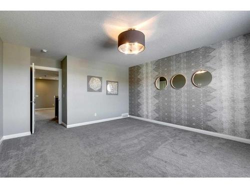 419 Rivercrest Boulevard, Cochrane, AB - Indoor Photo Showing Other Room