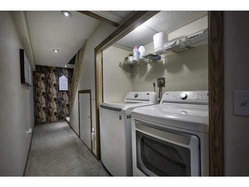 92 Somervale Park Sw, Calgary, AB - Indoor Photo Showing Laundry Room