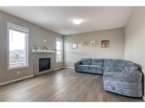 120 Nolancrest Circle Nw, Calgary, AB - Indoor Photo Showing Living Room With Fireplace
