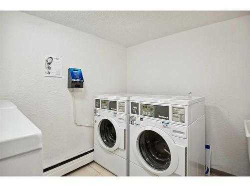 101-1113 37 Street Sw, Calgary, AB - Indoor Photo Showing Laundry Room