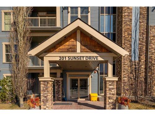 408-201 Sunset Drive, Cochrane, AB - Outdoor With Facade