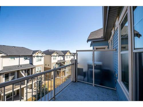 408-201 Sunset Drive, Cochrane, AB - Outdoor With Exterior
