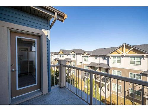 408-201 Sunset Drive, Cochrane, AB - Outdoor With Exterior