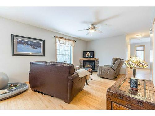 37-423002 Range Road 10, Rural Ponoka County, AB - Indoor Photo Showing Living Room With Fireplace