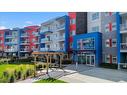 2206-19489 Main Street Se, Calgary, AB  - Outdoor With Balcony With Facade 