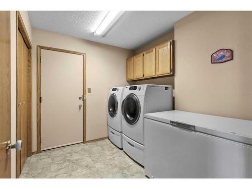 123 Scenic Ridge Court Nw, Calgary, AB - Indoor Photo Showing Laundry Room
