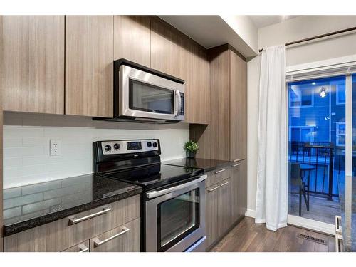 254 Silverado Common Sw, Calgary, AB - Indoor Photo Showing Kitchen With Stainless Steel Kitchen With Upgraded Kitchen