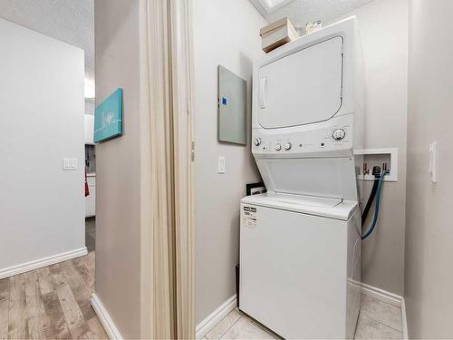 302-2611 15A Street Sw, Calgary, AB - Indoor Photo Showing Laundry Room
