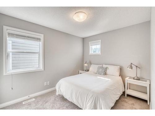 132 Riviera Way, Cochrane, AB - Indoor Photo Showing Bedroom