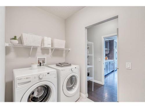 132 Riviera Way, Cochrane, AB - Indoor Photo Showing Laundry Room