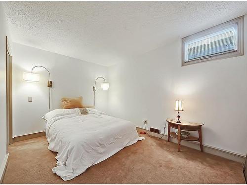 1134 Premier Way Sw, Calgary, AB - Indoor Photo Showing Bedroom