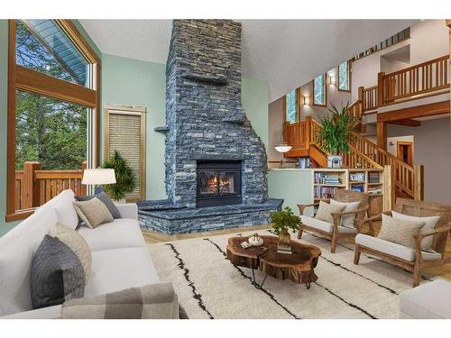 21 Blue Grouse Ridge, Canmore, AB - Indoor Photo Showing Living Room With Fireplace